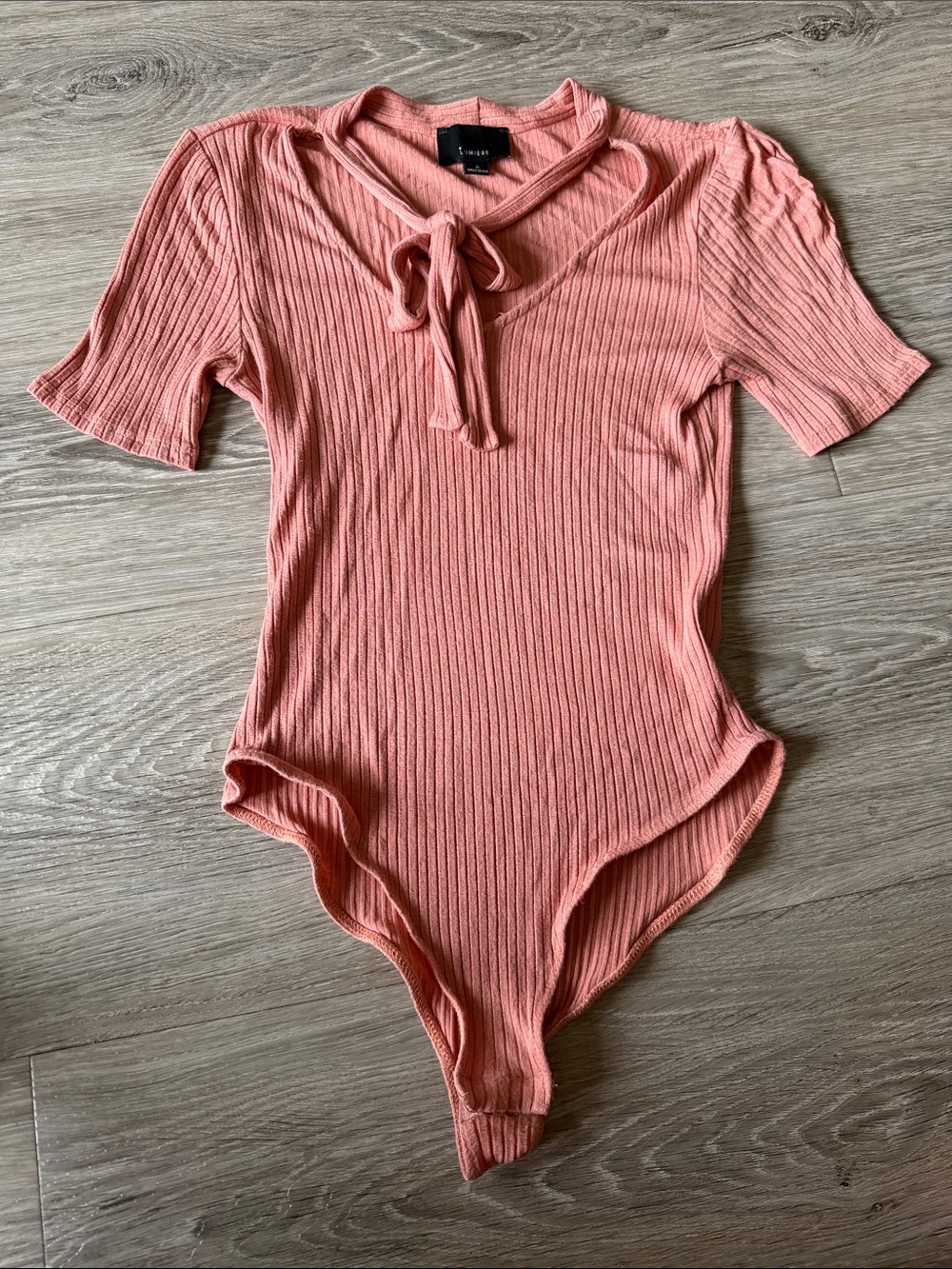 Lumiere Ribbed Tie-Neck Bodysuit in Coral Pink
